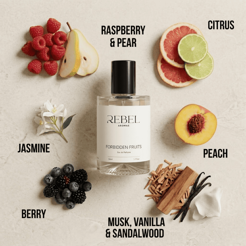 Perfume bottle labeled 'Rebel Aromas' surrounded by fruits and flowers on a textured surface