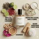 Perfume bottle labeled 'Santal 34' by Rebel Aromas with natural elements on a beige background