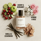 Rebel Aromas cherry temptation perfume bottle with cherry, bergamot, jasmine, rose, vanilla, and cedarwood on a light background.